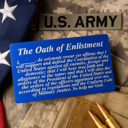 Blue/silver metal keepsake card with U.S. Army Oath of Enlistment on a camouflage background with American flag and bullets.