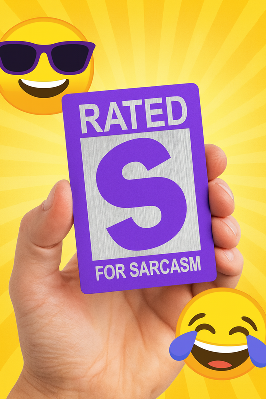 Hand holding a purple/silver metal card with 'Rated S for Sarcasm' on a yellow background with emojis.