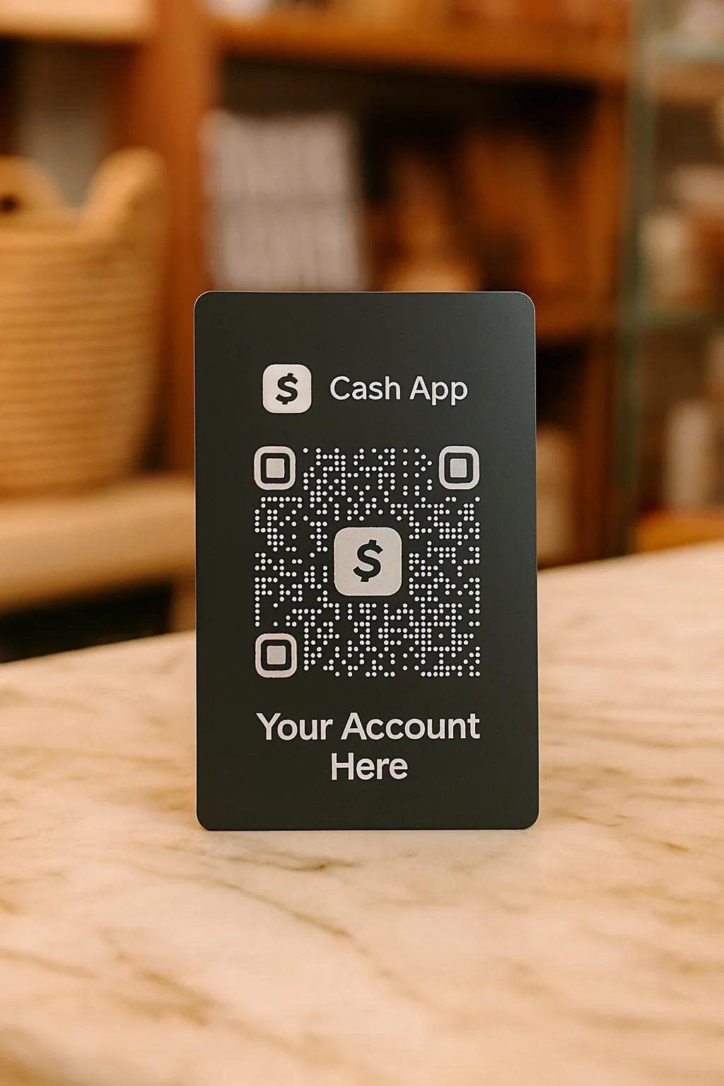Black card with Cash App QR code and placeholder text on a wooden surface