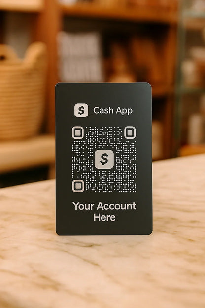 Black card with Cash App QR code and placeholder text on a wooden surface