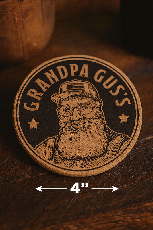 Circular logo engraved on personalized cork coaster, product size demonstration text on a wooden desk background 