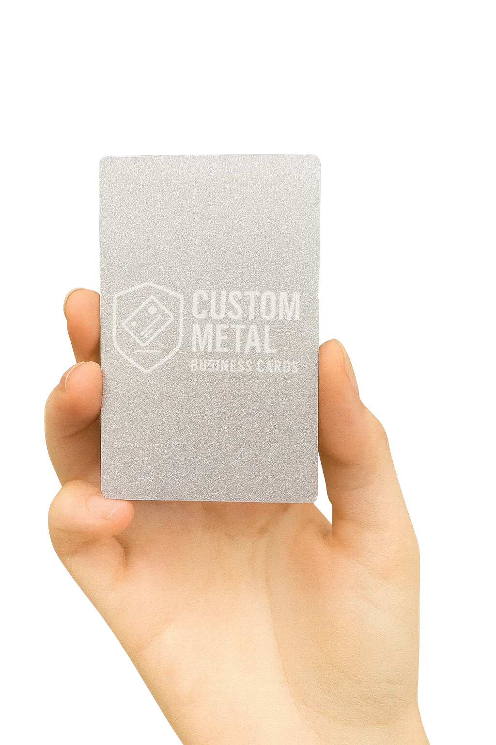 Hand holding a silver card with 'Custom Metal Business Cards' text on a white background
