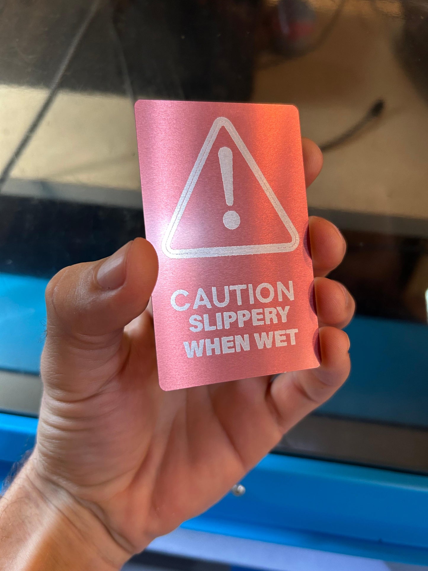 Metal "Slippery When Wet" laser engraved signage