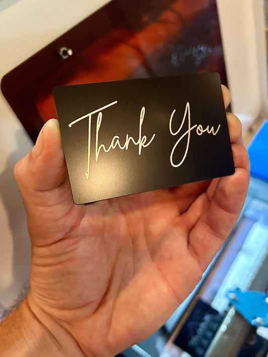 Metal Thank You card laser engraved in black/silver anodized aluminum