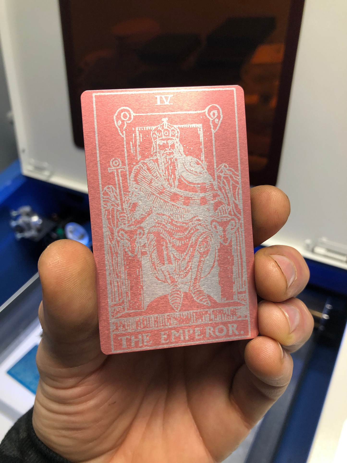 Rose gold/silver metal gift card with the emperor laser engraved on anodized aluminum