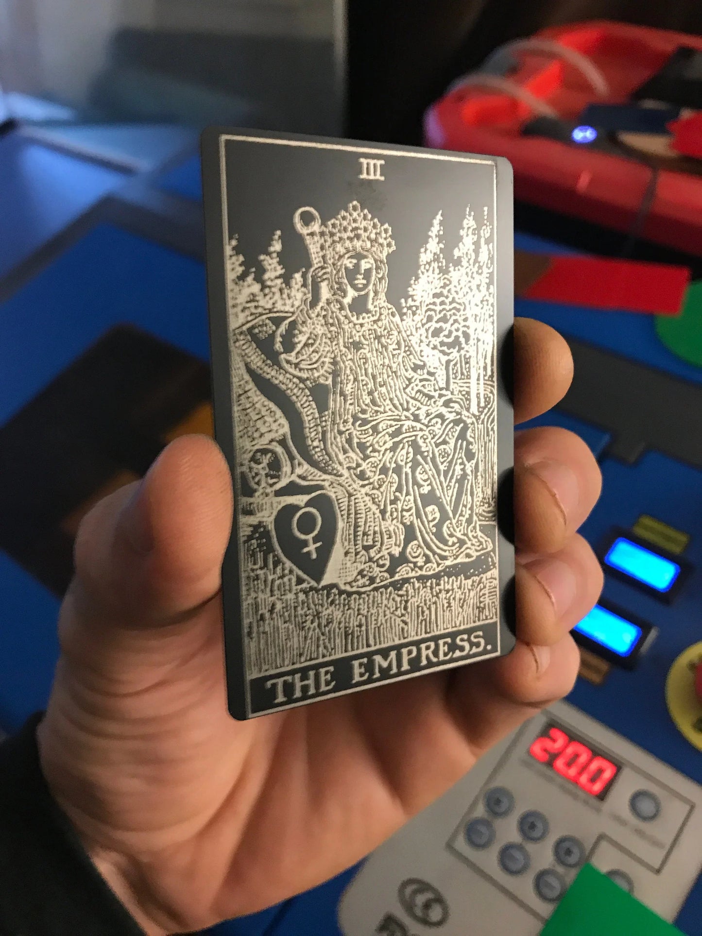 Metal tarot card with The Empress design laser engraved in black/silver