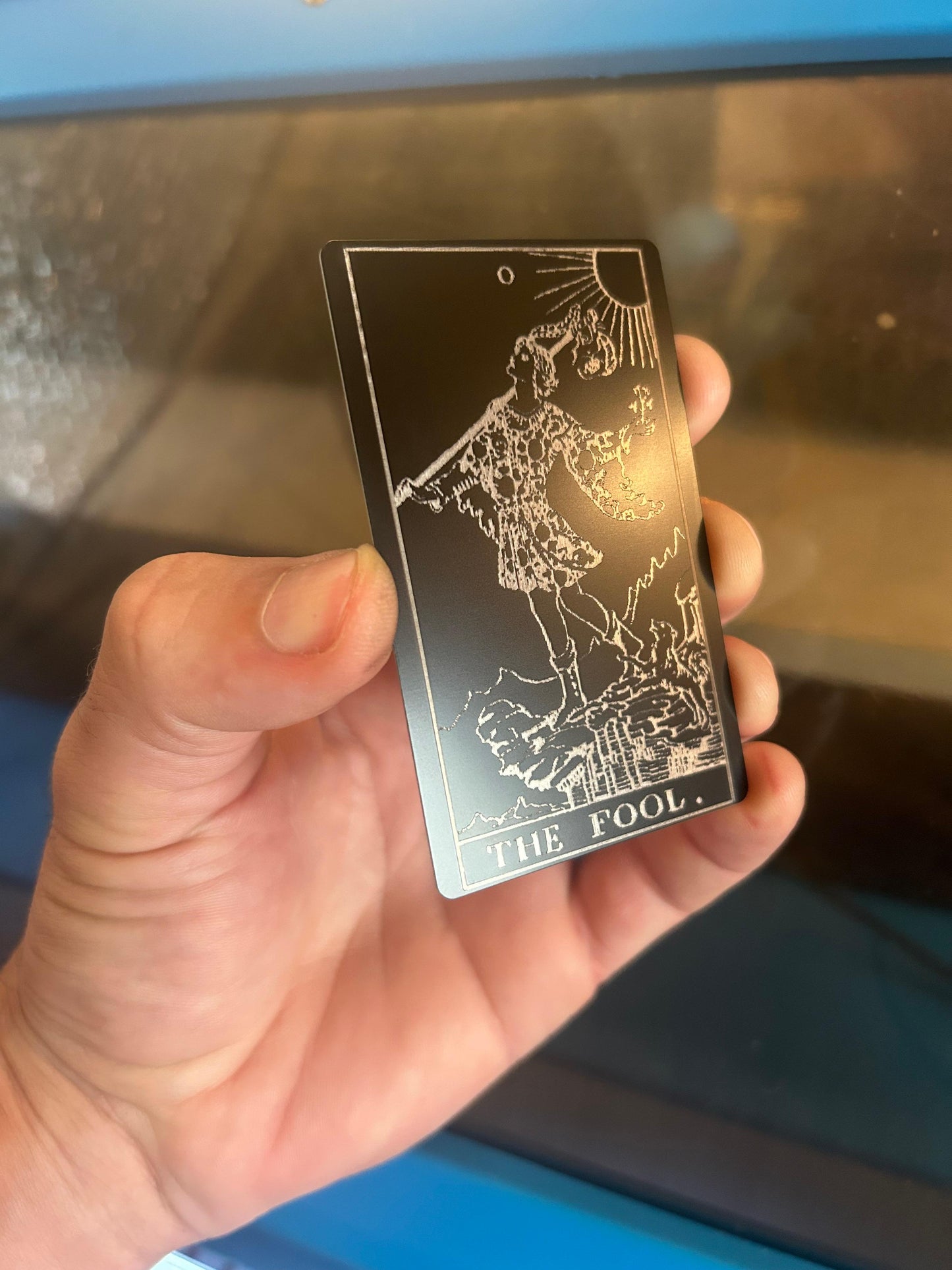 Metal 'The Fool' Tarot Card laser engraving in black/silver