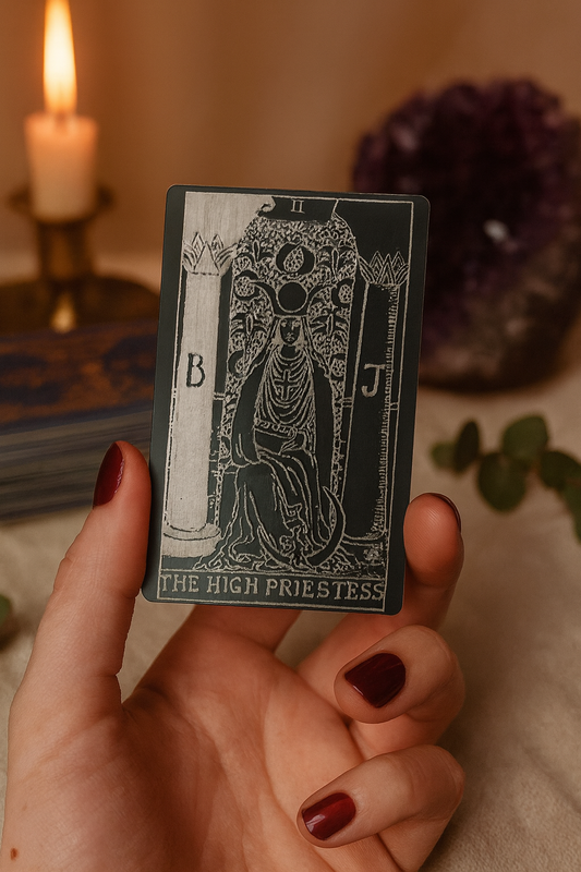 Mockup for laser engraved metal keepsake tarot card with "The High Priestess" design