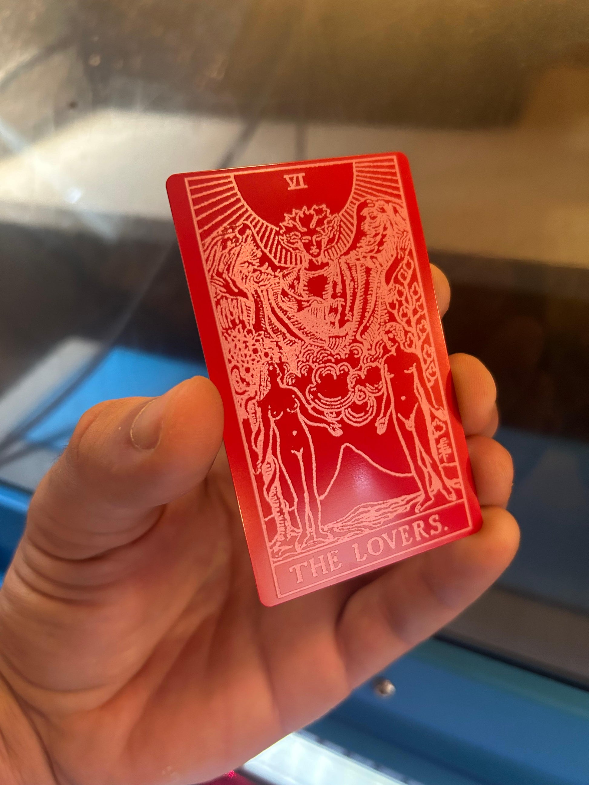 The Lovers metal tarot card in red/silver anodized aluminum