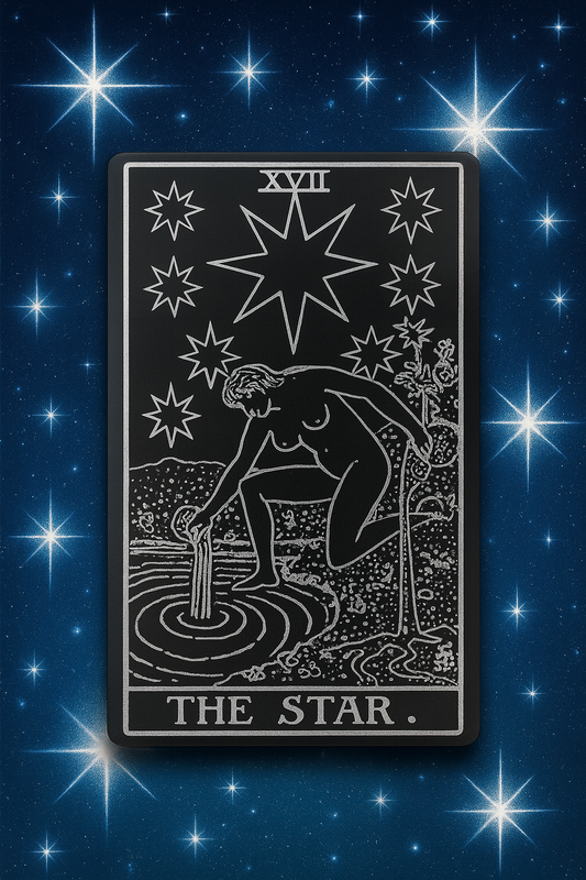 Metal matte black/silver Tarot card titled 'The Star' with a black and white illustration on a starry night background.