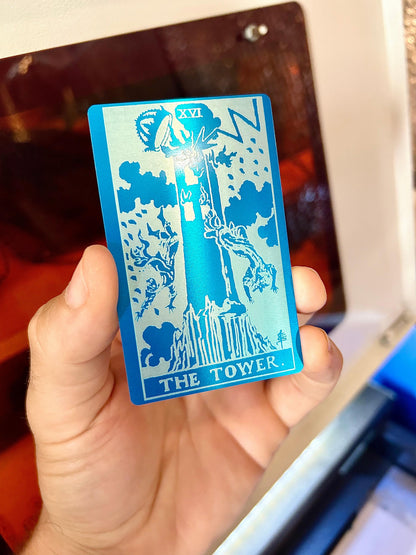 Metal The Tower tarot card laser engraved in blue/silver anodized aluminum