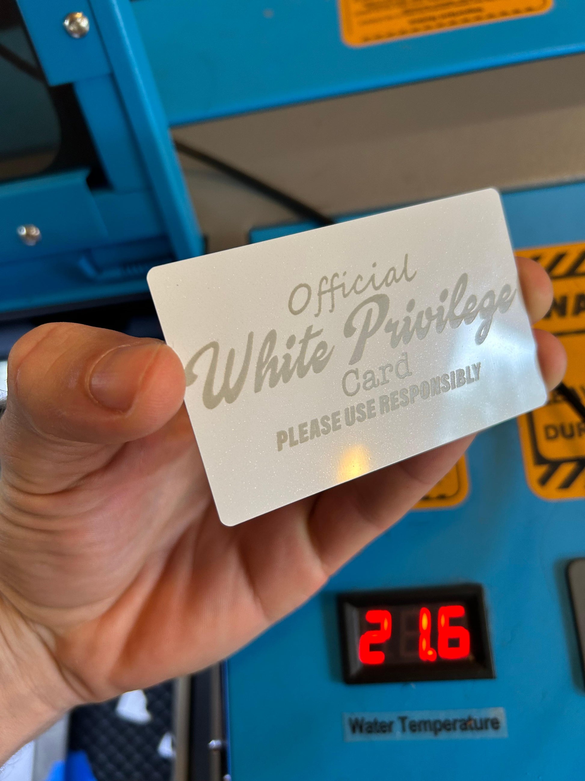 Metal "White Privilege Card" gag gift in white/silver